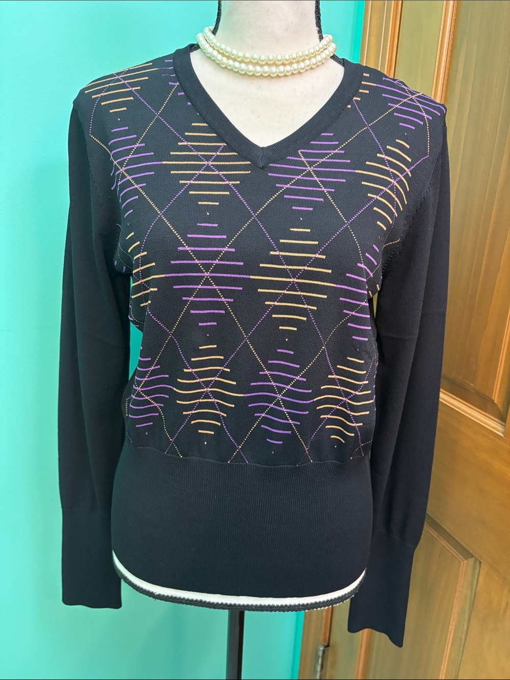 Greg Norman ladies Collection Black V-Neck Sweater with Purple & Gold Accents